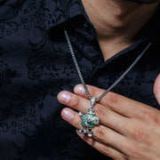 Dije Bolsa de Dinero Cash King en Plata 925 – Lujo con actitud